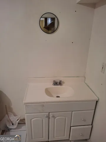 a bathroom with a sink and a toilet