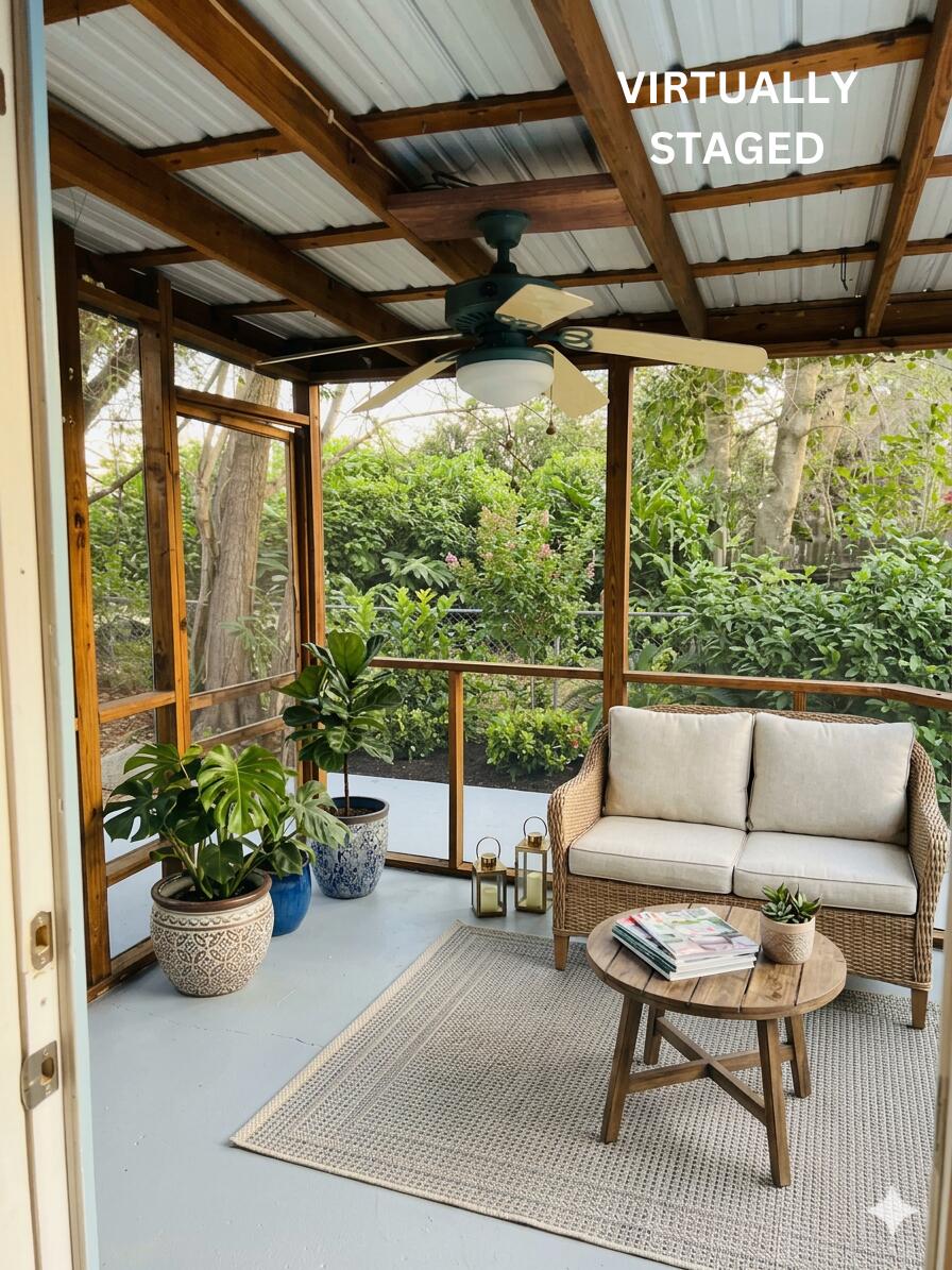 100 Newell Street Moncks Corner, SC 29461 - Photo 13 of 22 100 Newell Back Porch Enhanced without b