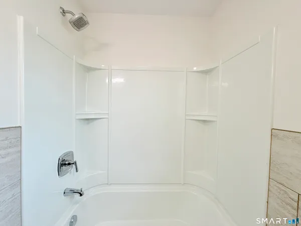 a bathroom with a bathtub