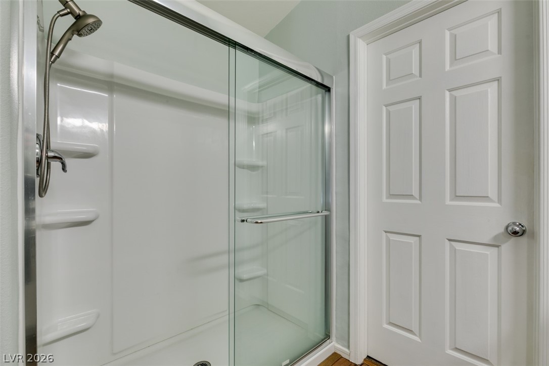 2187 Chapman Ranch Drive Henderson, NV 89012 - Photo 19 of 26 This bright bedroom offers lots of space and closet area.