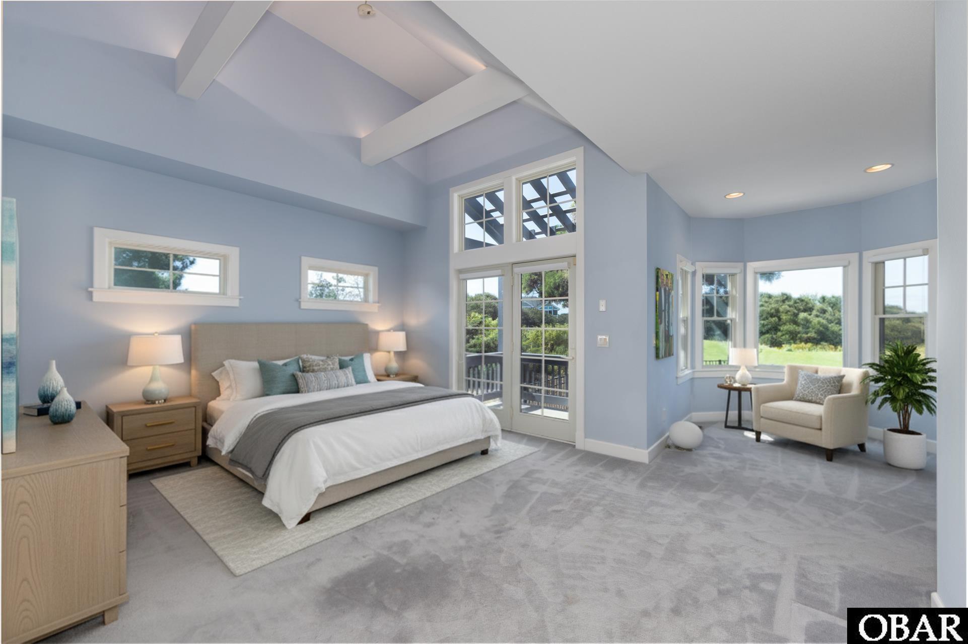 748 Dune Point Road Corolla, NC 27927 - Photo 17 of 44 1st floor ensuite staged