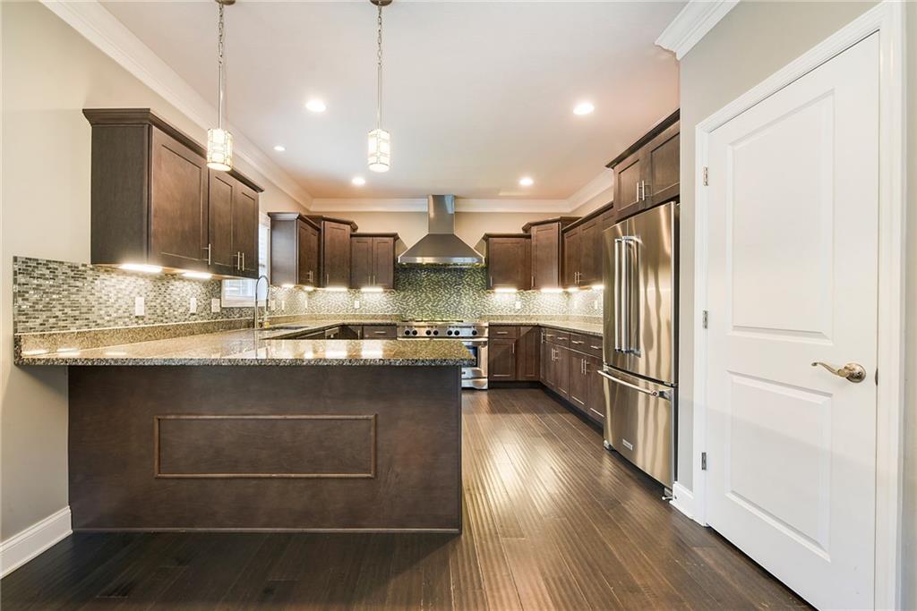 103 Timothy Trail Beaver, PA 15009 - Photo 3 of 25 a kitchen with kitchen island a counter top space a sink stainless steel appliances and cabinets