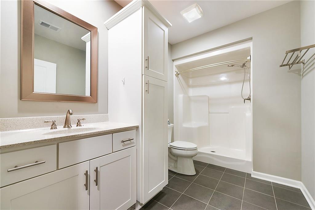 103 Timothy Trail Beaver, PA 15009 - Photo 21 of 25 a bathroom with a sink a toilet and a mirror