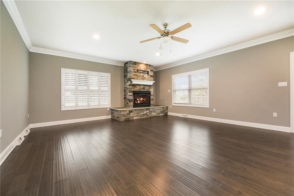 103 Timothy Trail Beaver, PA 15009 - Photo 7 of 25 an empty room with windows fireplace and windows
