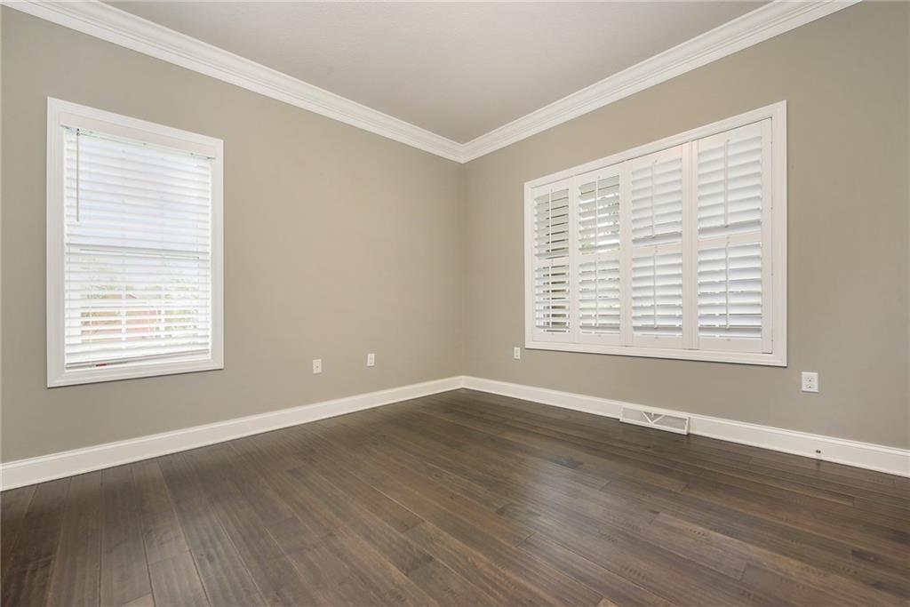103 Timothy Trail Beaver, PA 15009 - Photo 10 of 25 a view of an empty room with wooden floor and a window