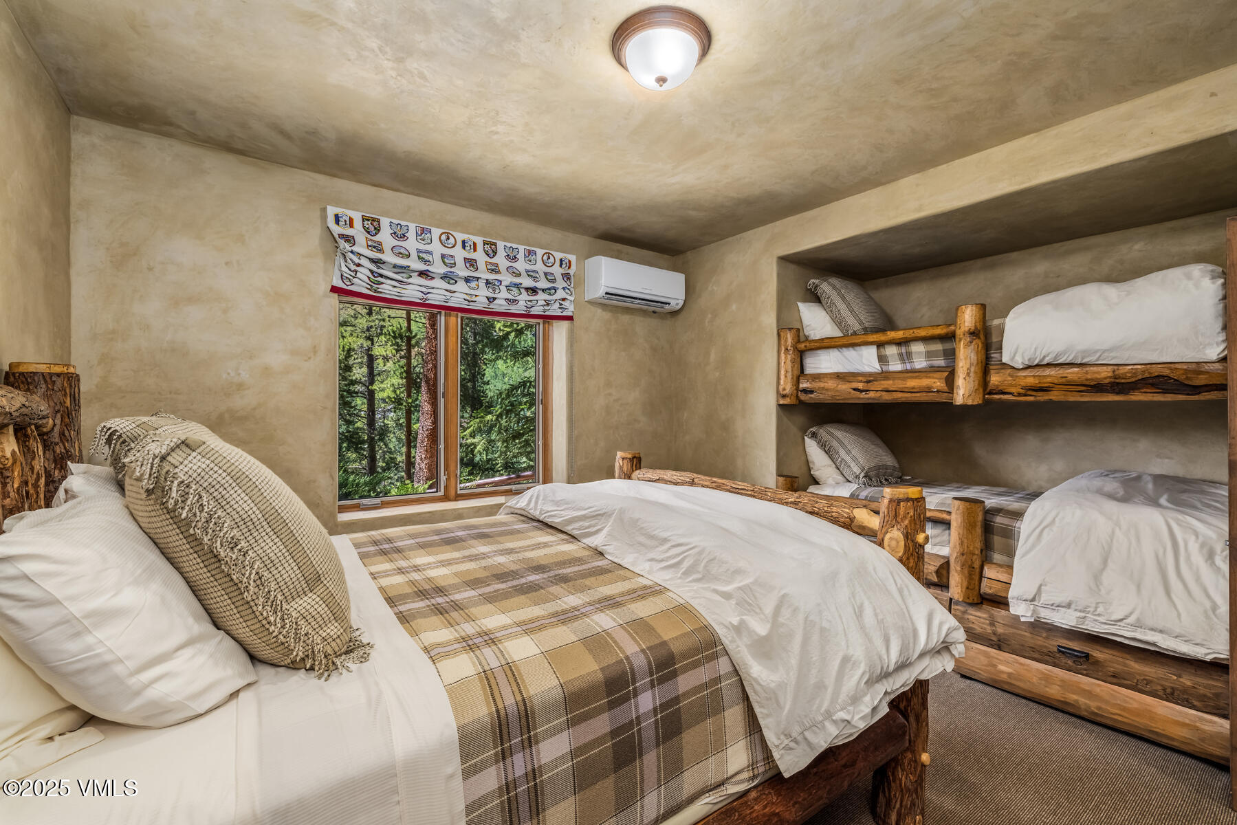 1452 Buffehr Creek Road Vail, CO 81657 - Photo 55 of 66 a bedroom with a bed and window