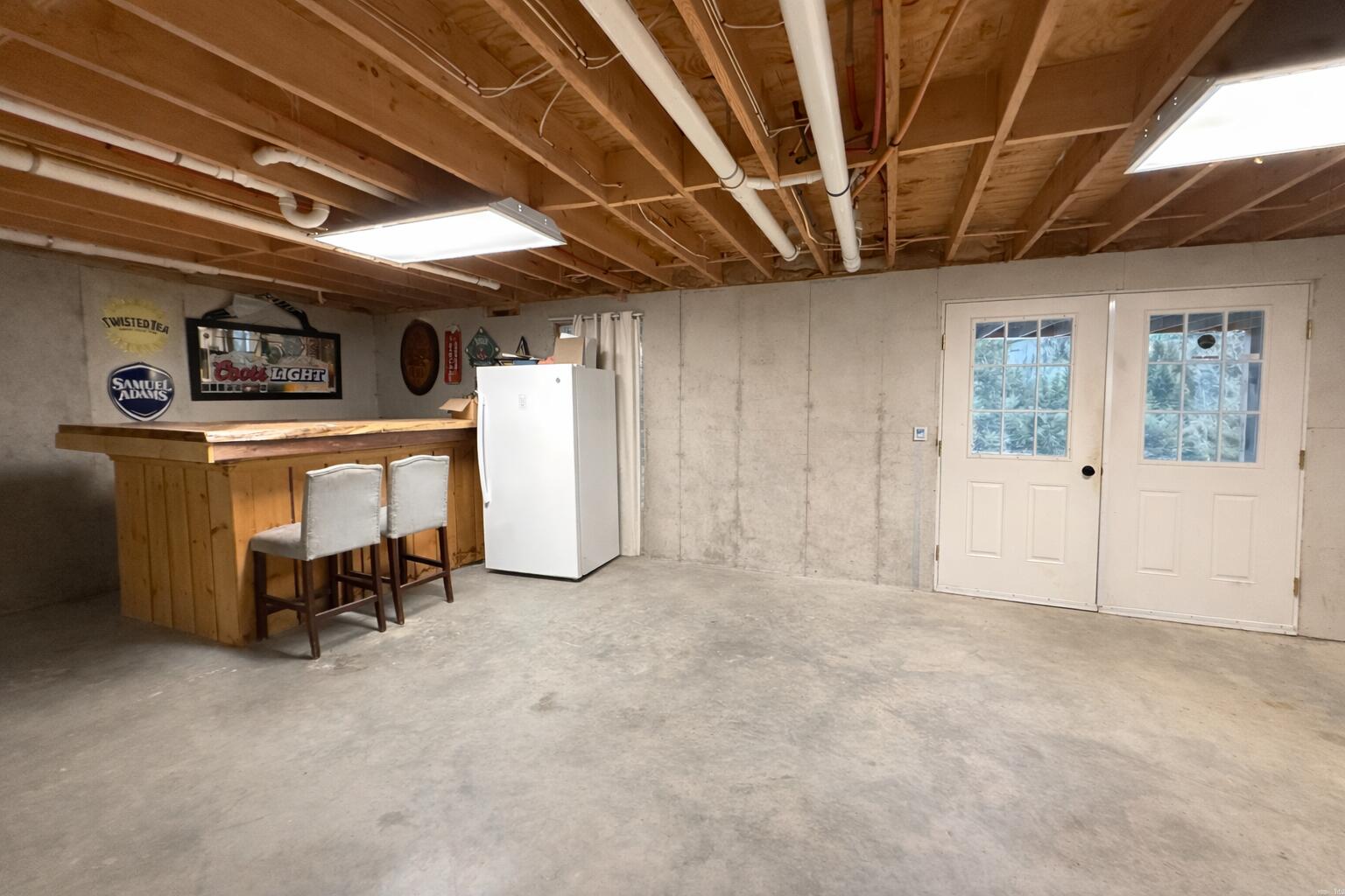 220 Boggy Brook Road Ellsworth, ME 04605 - Photo 44 of 49 Basement with bar area
