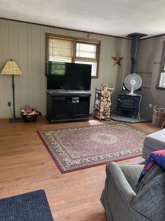 68 Thayer Circle Randolph, MA 02368 - Photo 14 of 25 a living room with furniture and a flat screen tv