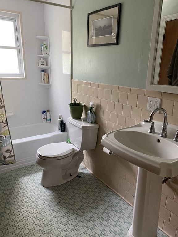 68 Thayer Circle Randolph, MA 02368 - Photo 16 of 25 a bathroom with a sink toilet and shower