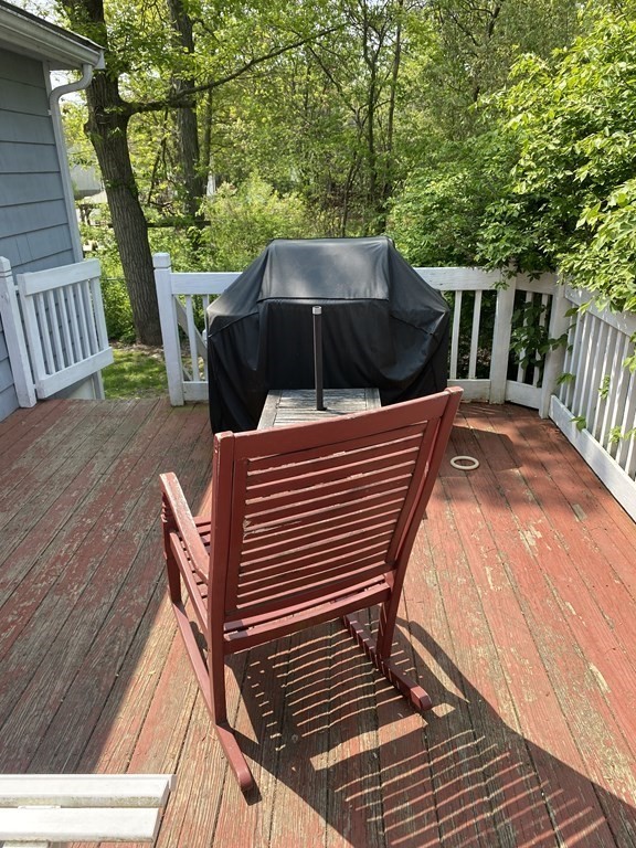 68 Thayer Circle Randolph, MA 02368 - Photo 24 of 25 a view of a wooden deck with furniture