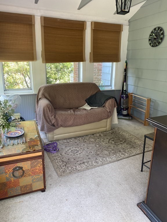 68 Thayer Circle Randolph, MA 02368 - Photo 7 of 25 a living room with furniture and window
