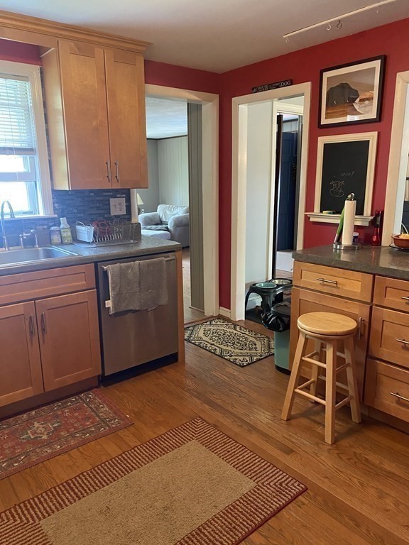 68 Thayer Circle Randolph, MA 02368 - Photo 9 of 25 a kitchen with a sink and a stove top oven