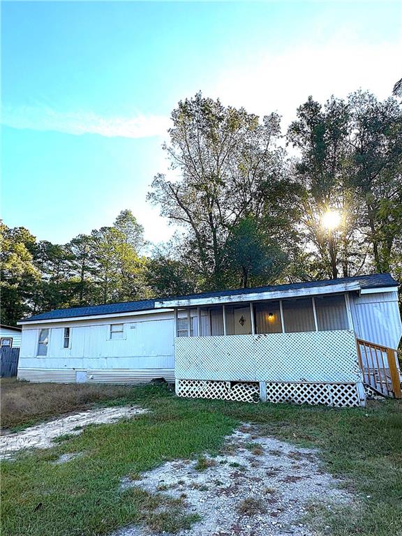 114 Skyland Drive East Locust Grove, GA 30248 - Photo 1 of 10 a view of a house with a yard