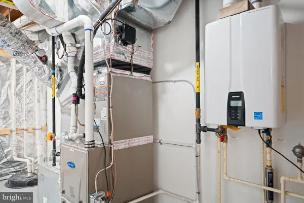 a view of water heater room with window