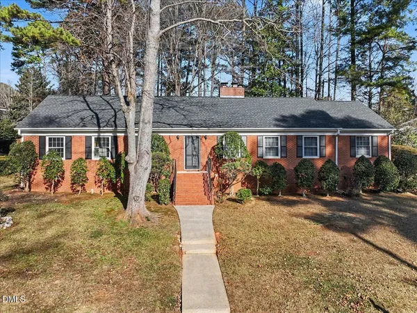 front view of a house with a patio