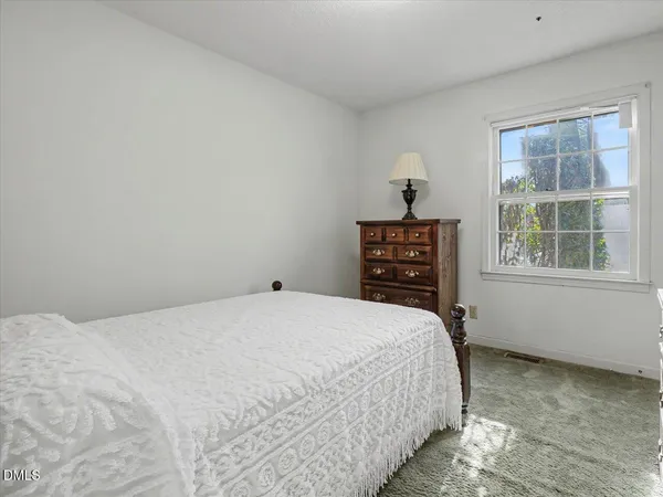 an empty room with wooden floor