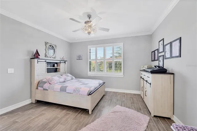 a bathroom with a double vanity sink mirror and shower