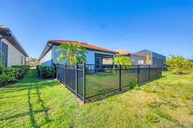 a view of swimming pool with a yard