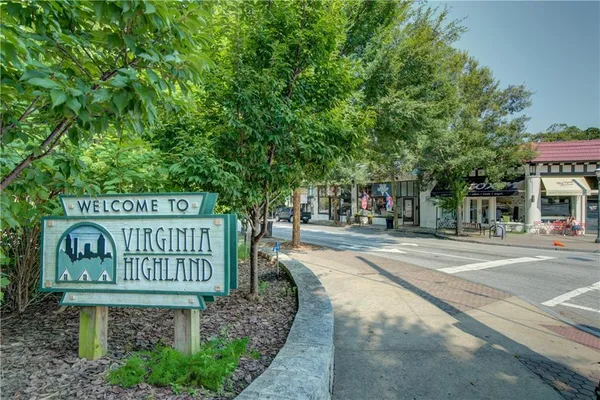 a sign board with parking space