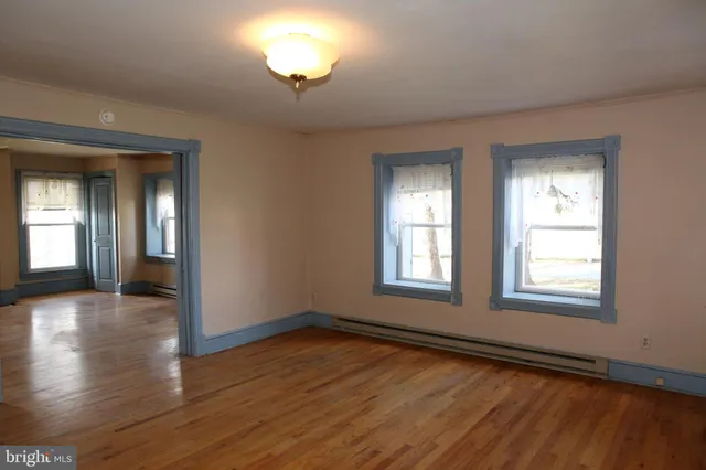 a kitchen with stainless steel appliances granite countertop a sink and a refrigerator