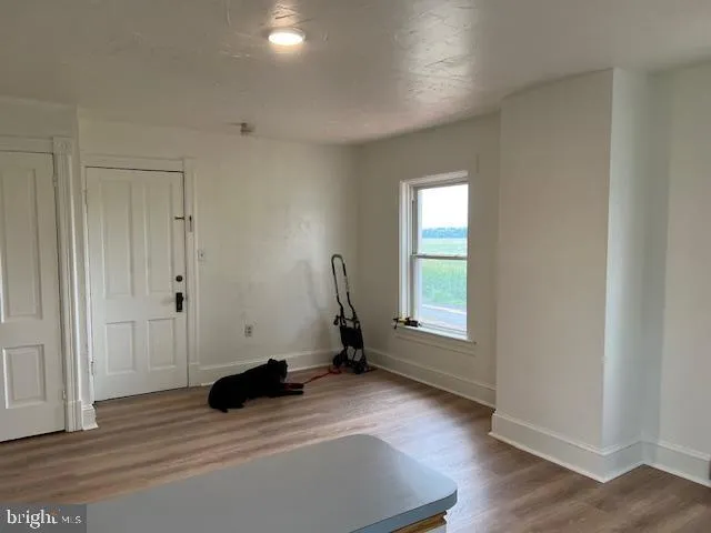 a view of a house with a swimming pool