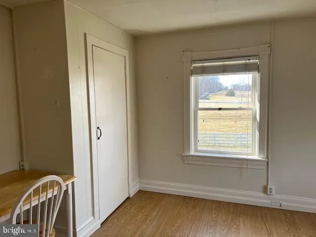 a view of a terrace with yard and outdoor seating