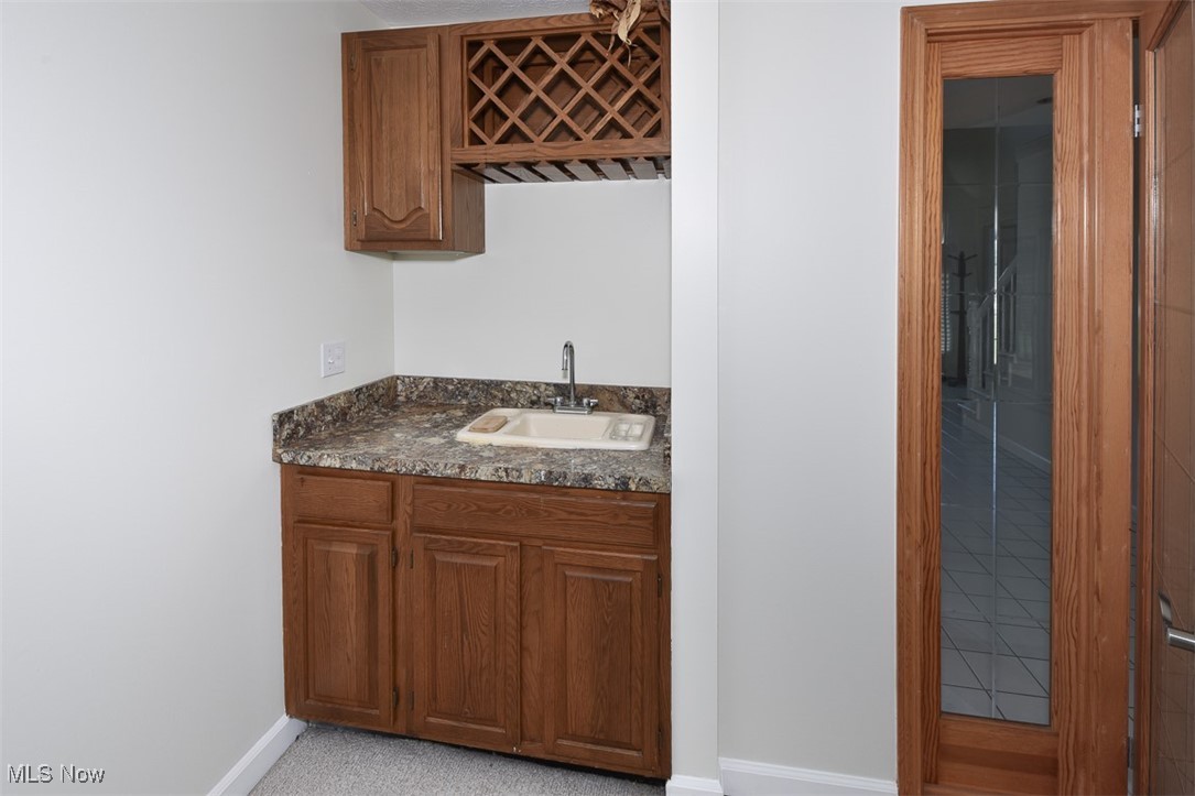 30776 Cedar Road Cleveland, OH 44124 - Photo 13 of 41 Indoor wet bar with baseboards