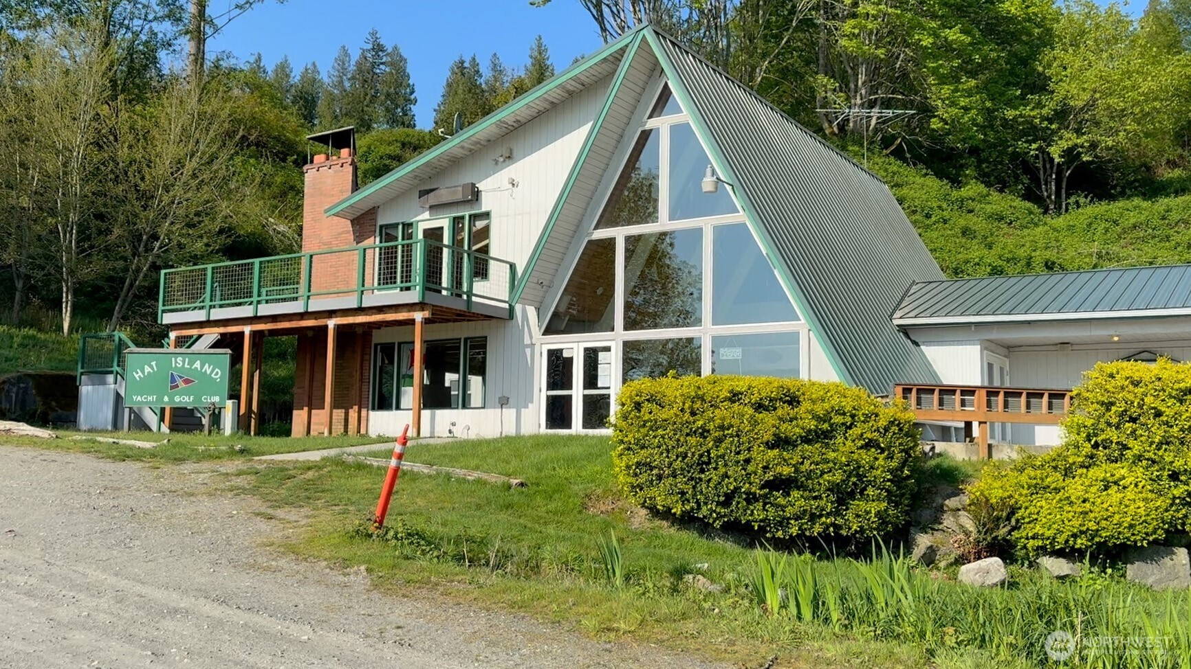 32 K Beach Way Hat Island, WA 98201 - Photo 16 of 21 a view of a house with a yard
