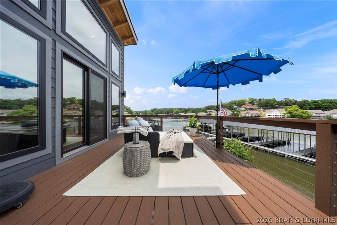 1151 Oak Road Osage Beach, MO 65065 - Photo 45 of 63 Covered lakeside deck offering panoramic views and