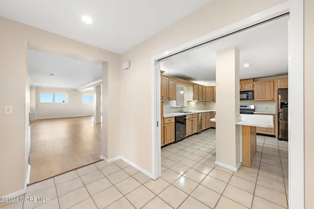 a view of a kitchen cabinets and a counter place