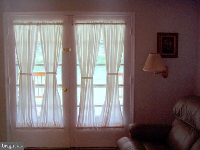 3709 Briars Road Olney, MD 20832 - Photo 6 of 16 French doors to outside porch