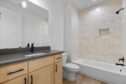 a kitchen with a sink and a microwave