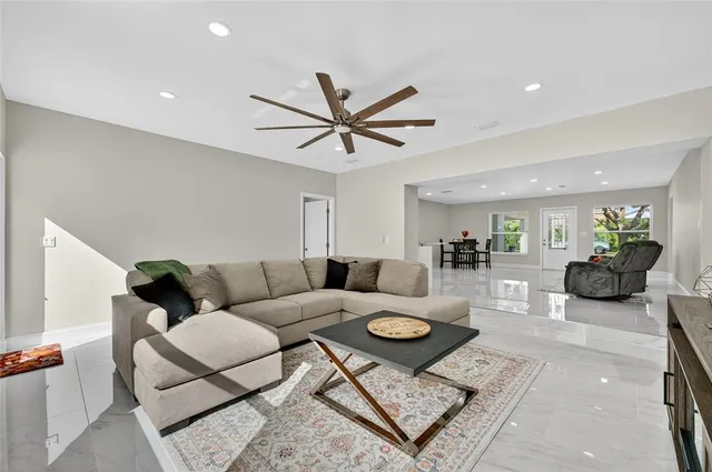 a living room with furniture and a table
