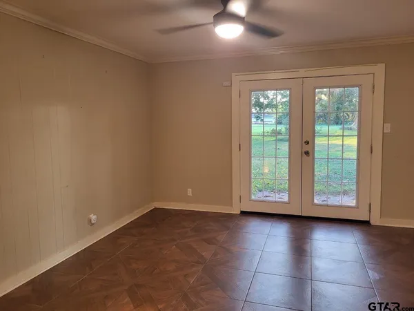 a view of a room with a large window