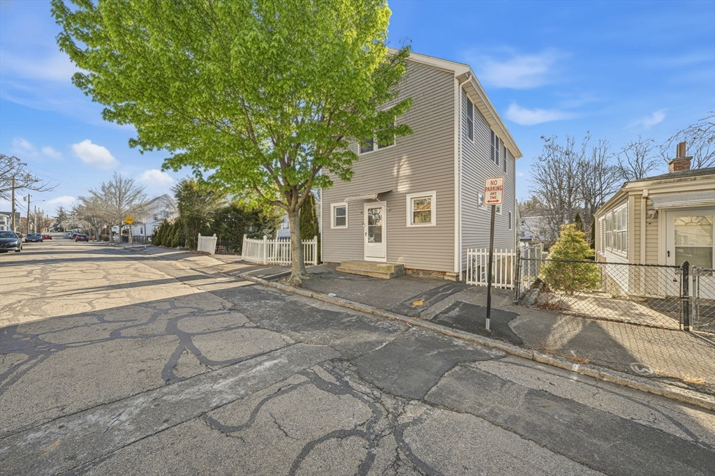 5 Main Street Quincy, MA 02169 - Photo 4 of 42 a view of a house with a yard