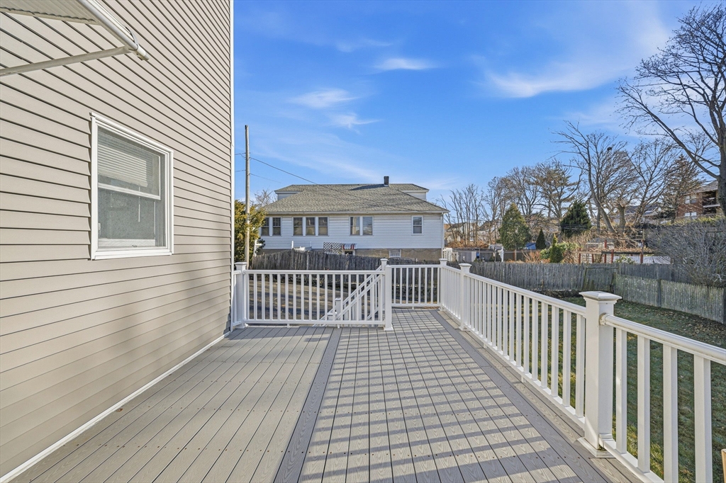 5 Main Street Quincy, MA 02169 - Photo 41 of 42 a view of a balcony with wooden floor