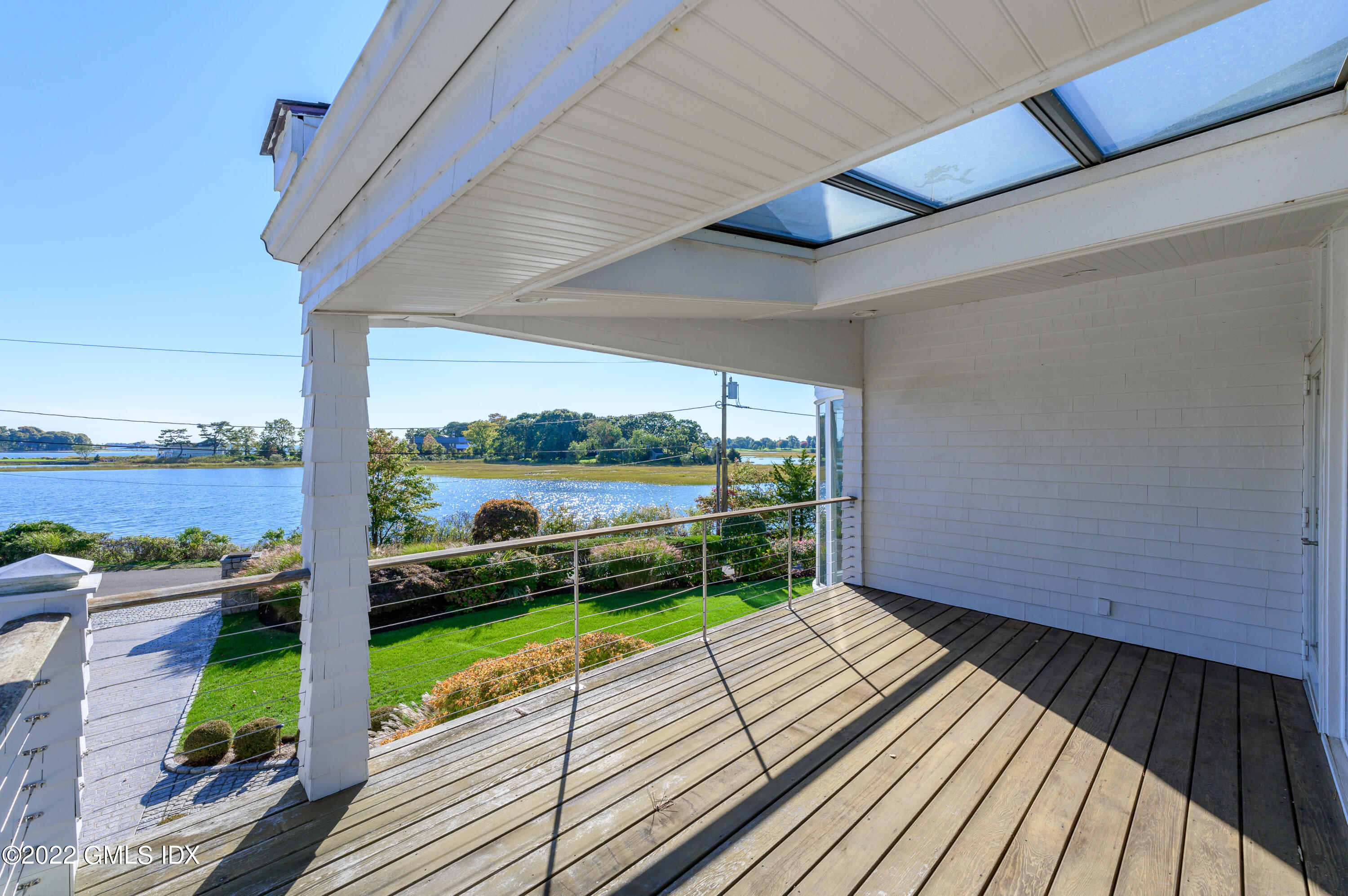 30 Surf Road Westport, CT 06880 - Photo 13 of 59 a view of a balcony with wooden floor
