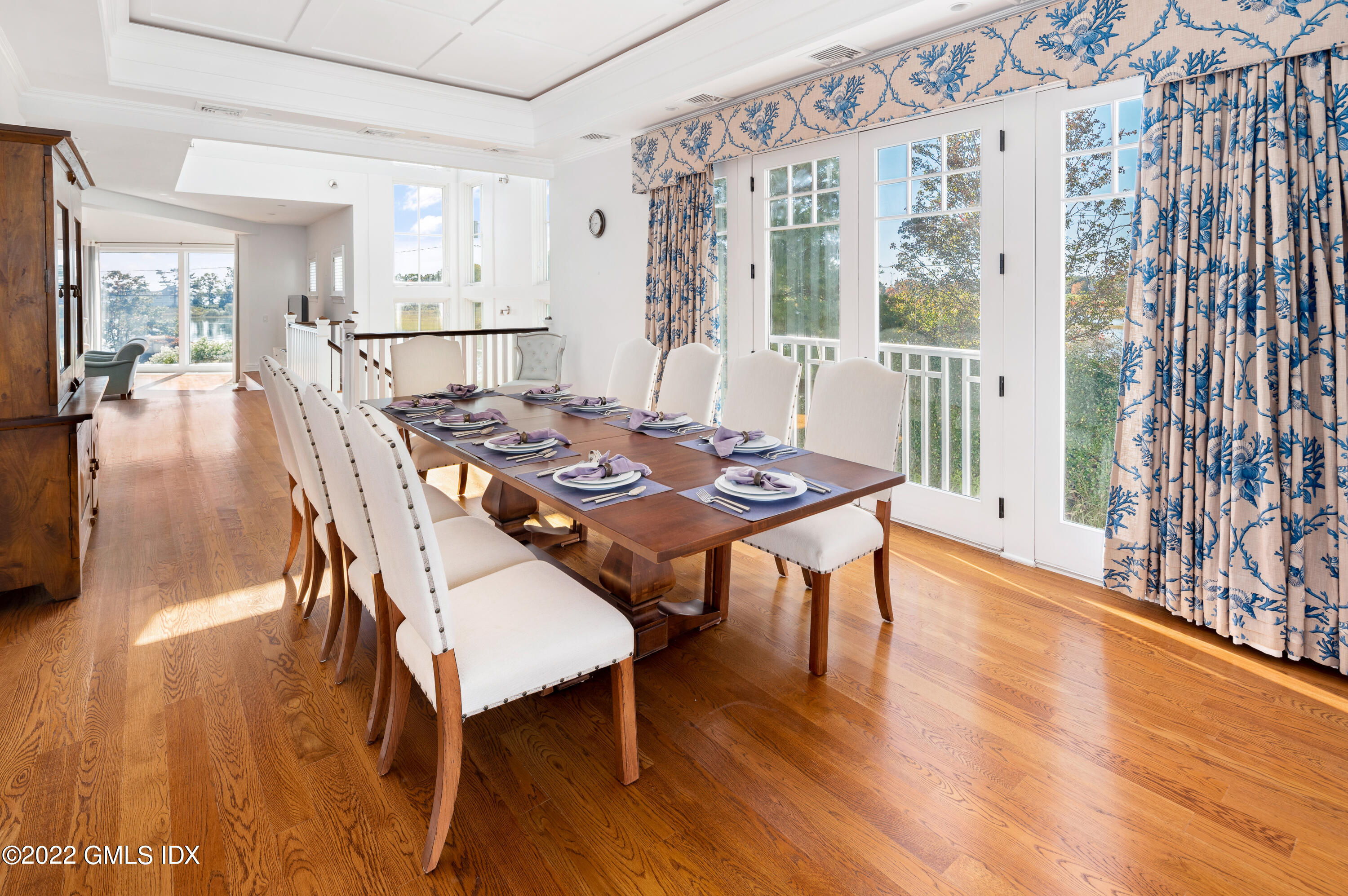 30 Surf Road Westport, CT 06880 - Photo 19 of 59 a view of a dining room with furniture and wooden floor