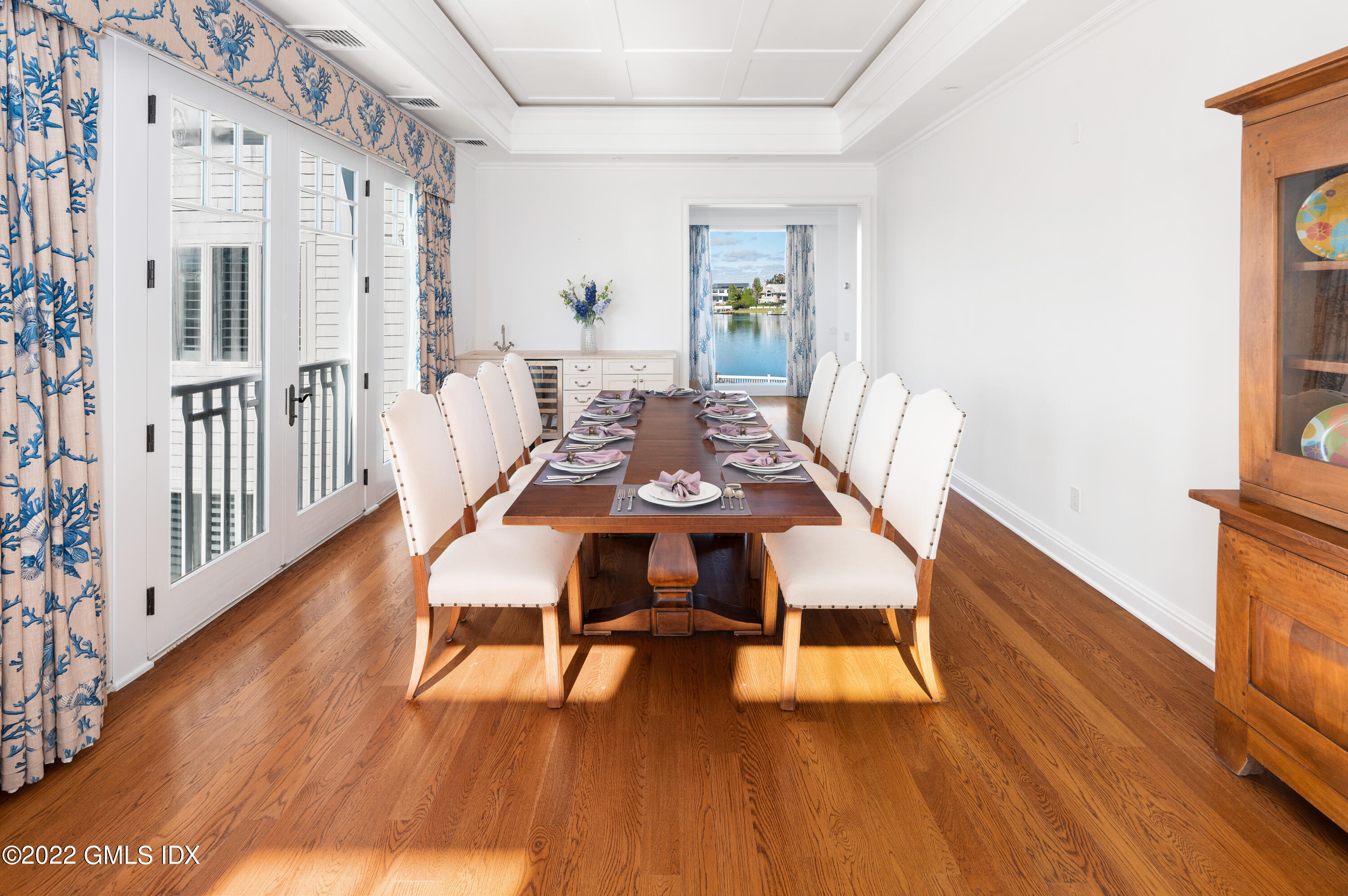 30 Surf Road Westport, CT 06880 - Photo 20 of 59 a view of a dining room with furniture and wooden floor
