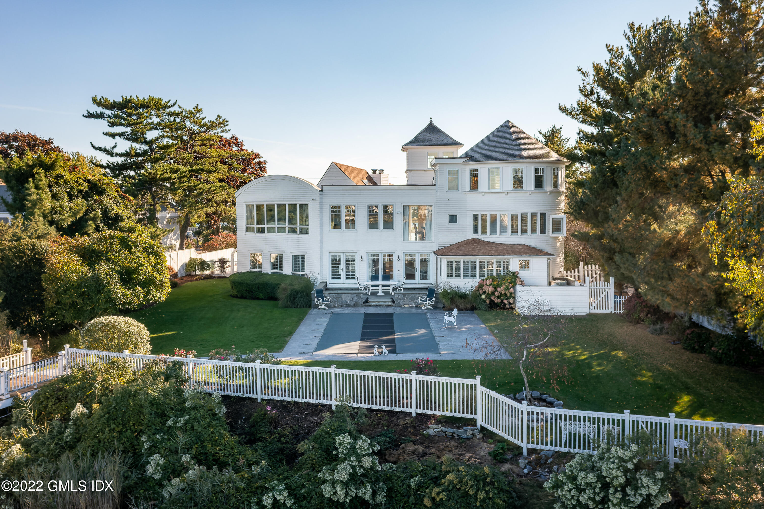 30 Surf Road Westport, CT 06880 - Photo 3 of 59 a front view of a house with garden