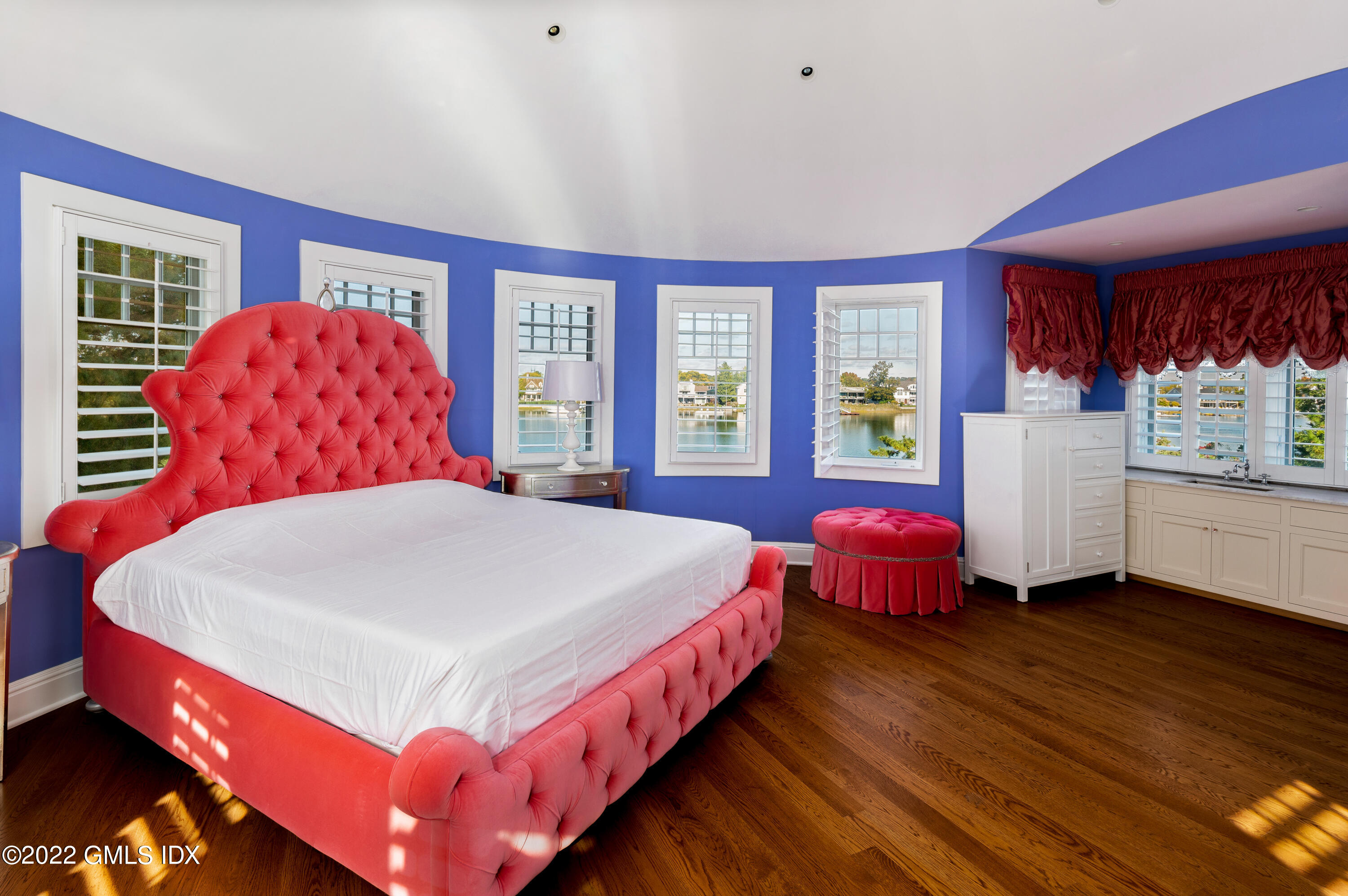 30 Surf Road Westport, CT 06880 - Photo 33 of 59 a bedroom with a bed and a large window