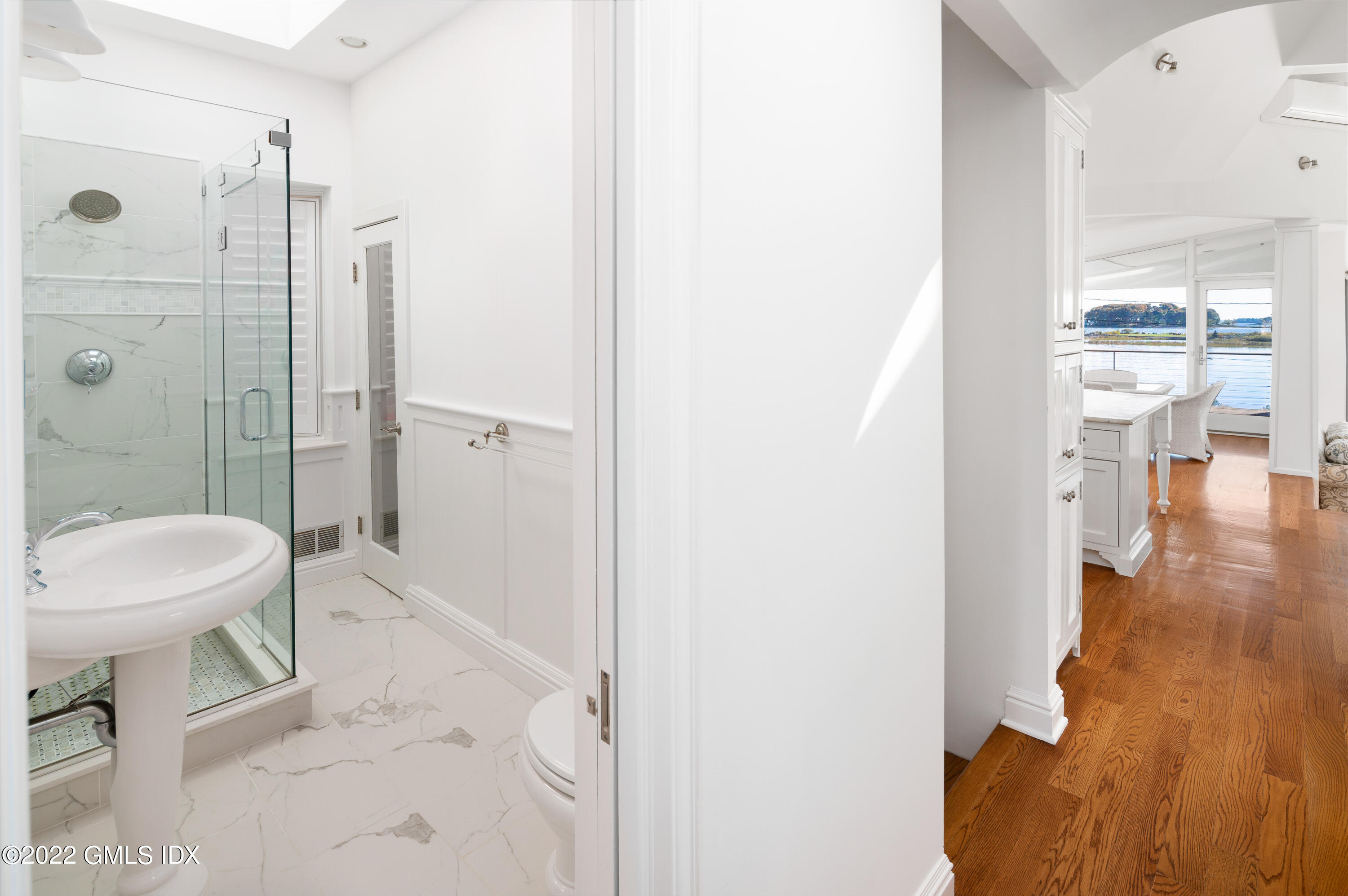 30 Surf Road Westport, CT 06880 - Photo 34 of 59 a bathroom with a sink toilet and shower