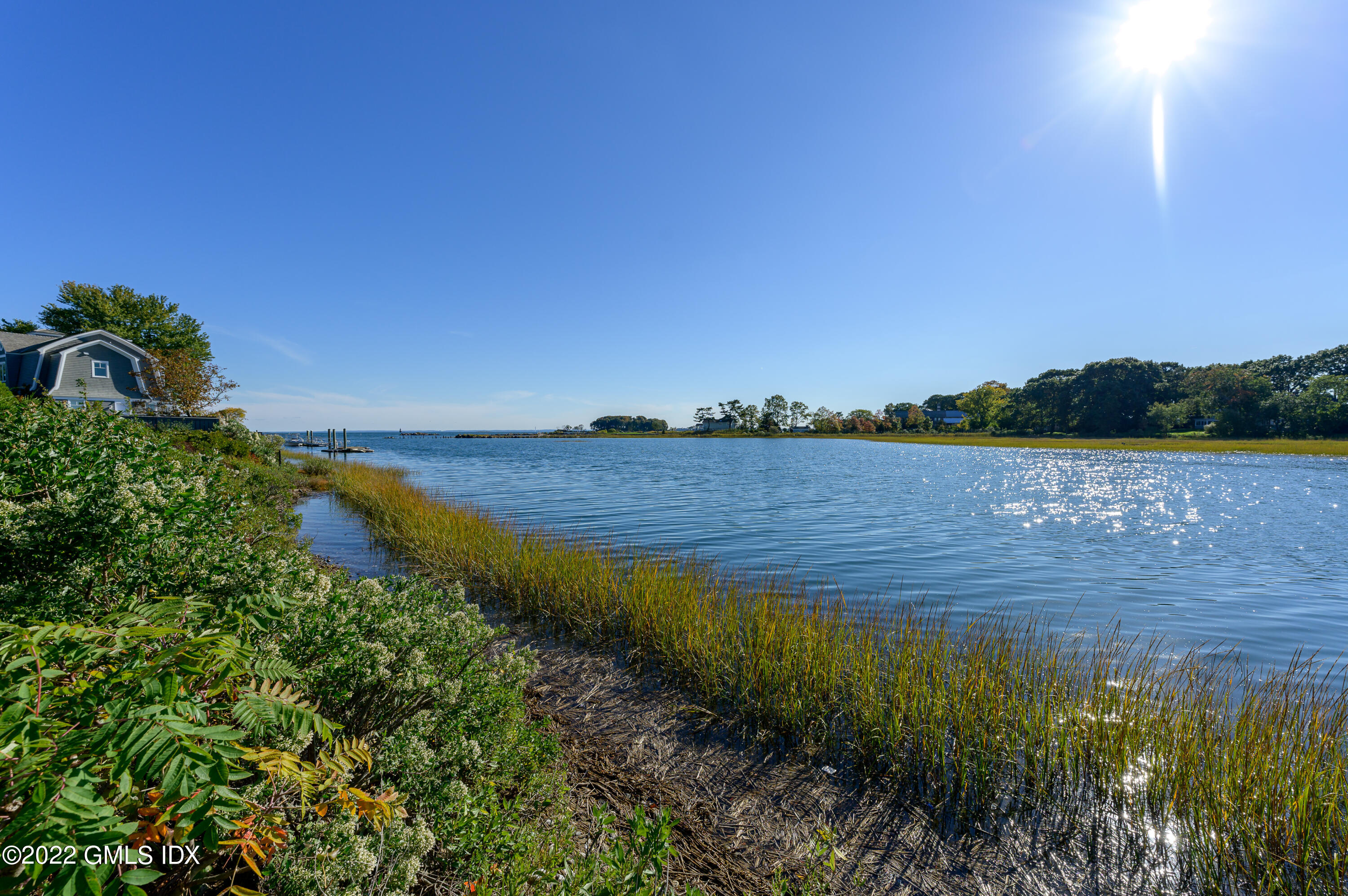 30 Surf Road Westport, CT 06880 - Photo 50 of 59 a view of a lake with a big yard