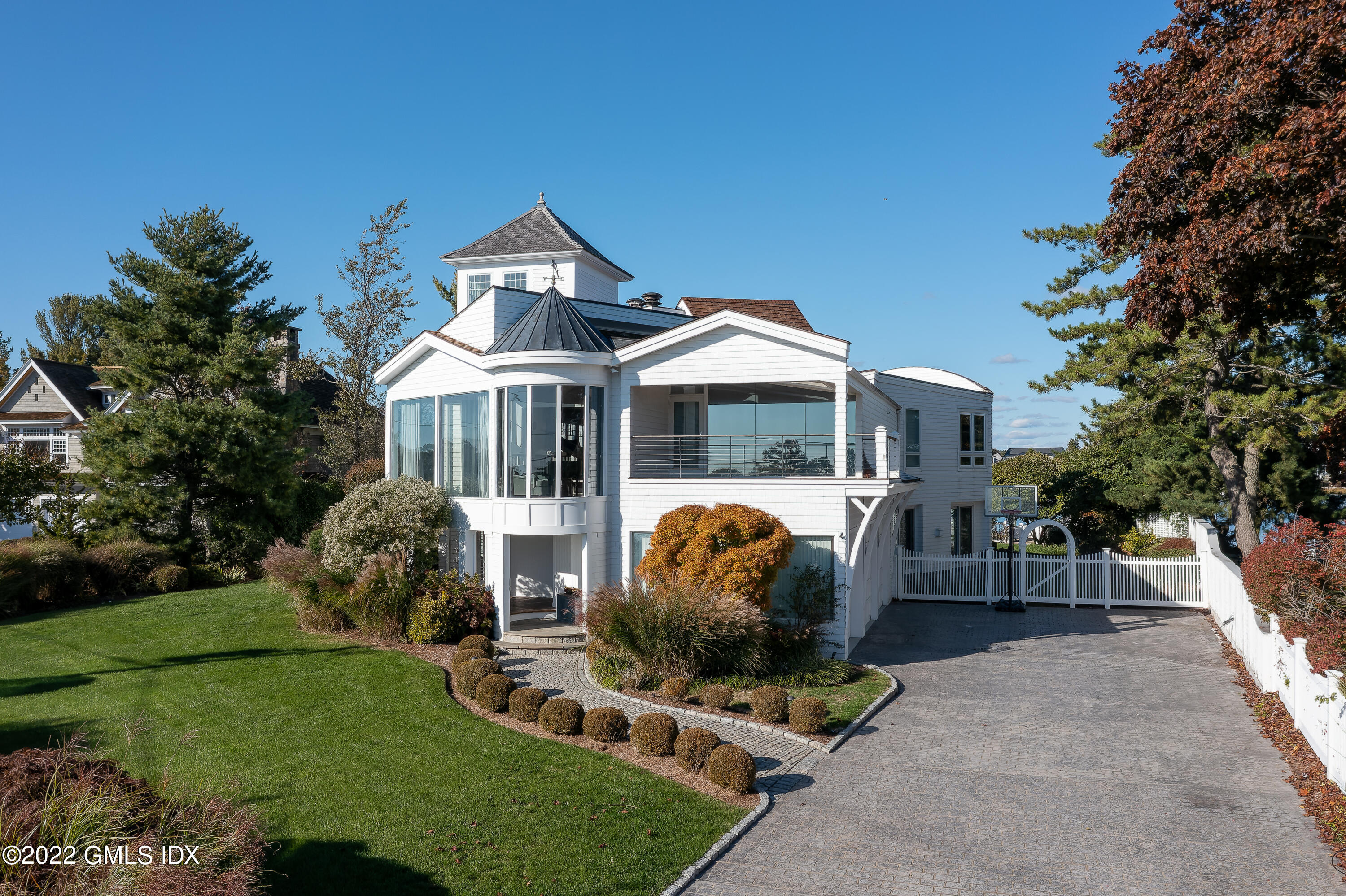 30 Surf Road Westport, CT 06880 - Photo 53 of 59 a front view of a house with garden