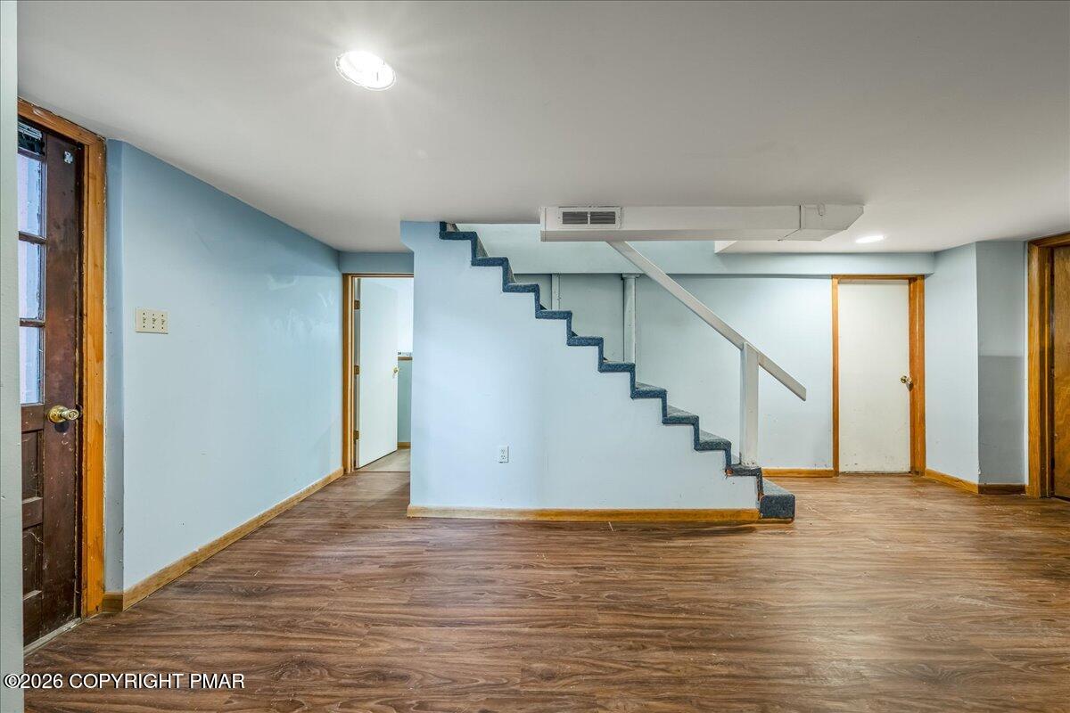 7136 Howell Terrace Stroudsburg, PA 18360 - Photo 21 of 35 a view of entryway and hall with wooden floor