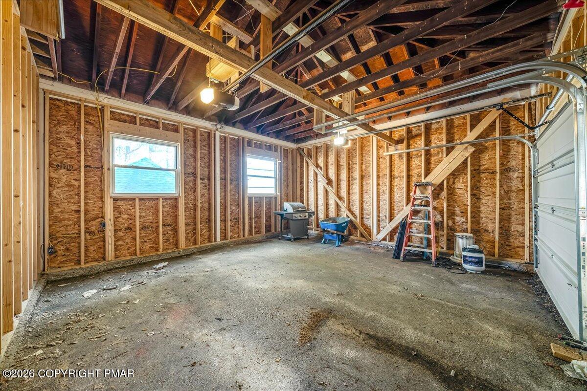 7136 Howell Terrace Stroudsburg, PA 18360 - Photo 30 of 35 a view of an empty room with wooden walls