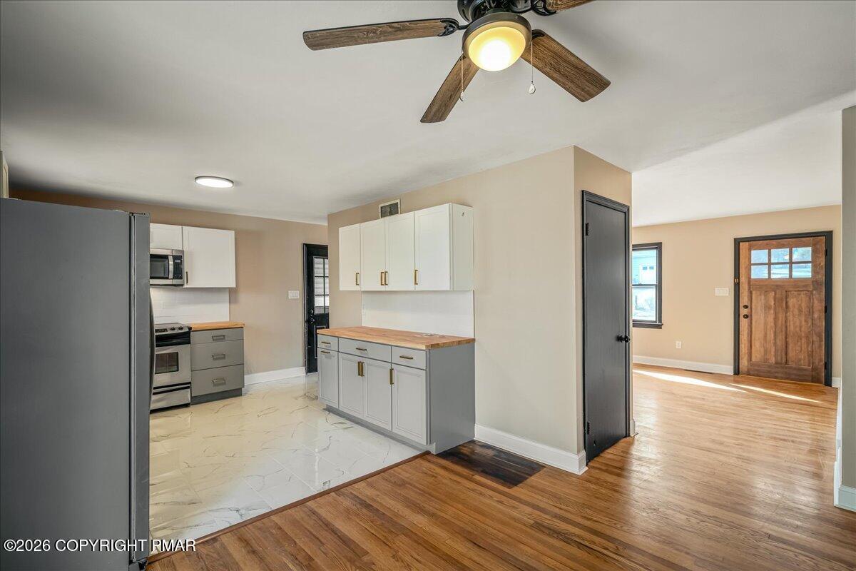 7136 Howell Terrace Stroudsburg, PA 18360 - Photo 9 of 35 a view of kitchen and wooden floor