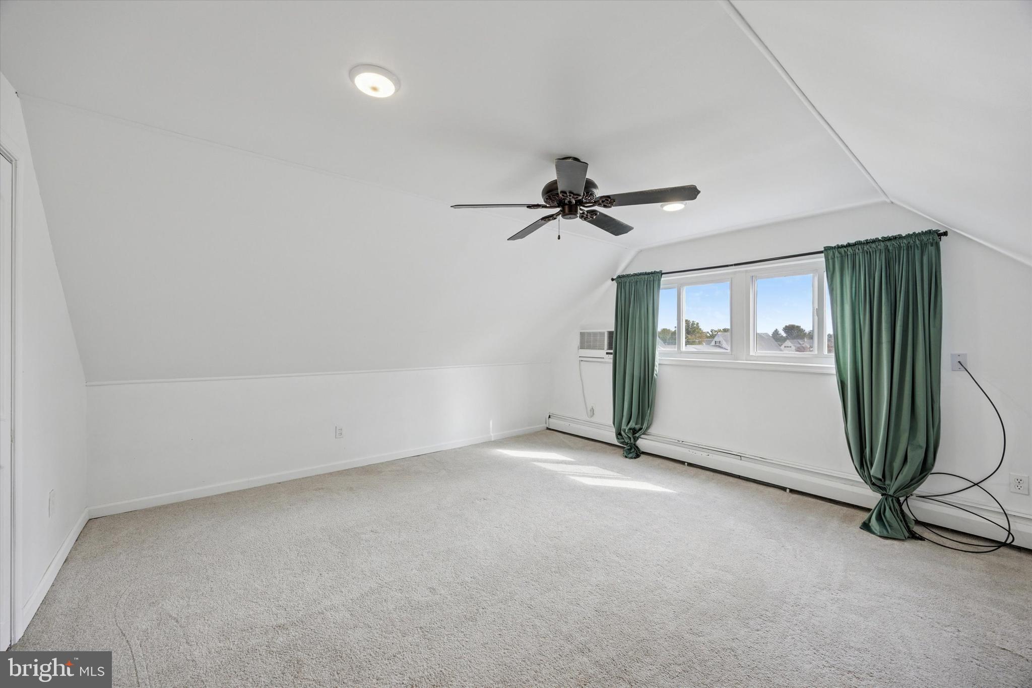 47 Cotton Road Levittown, PA 19057 - Photo 24 of 35 a view of a livingroom with a ceiling fan and window