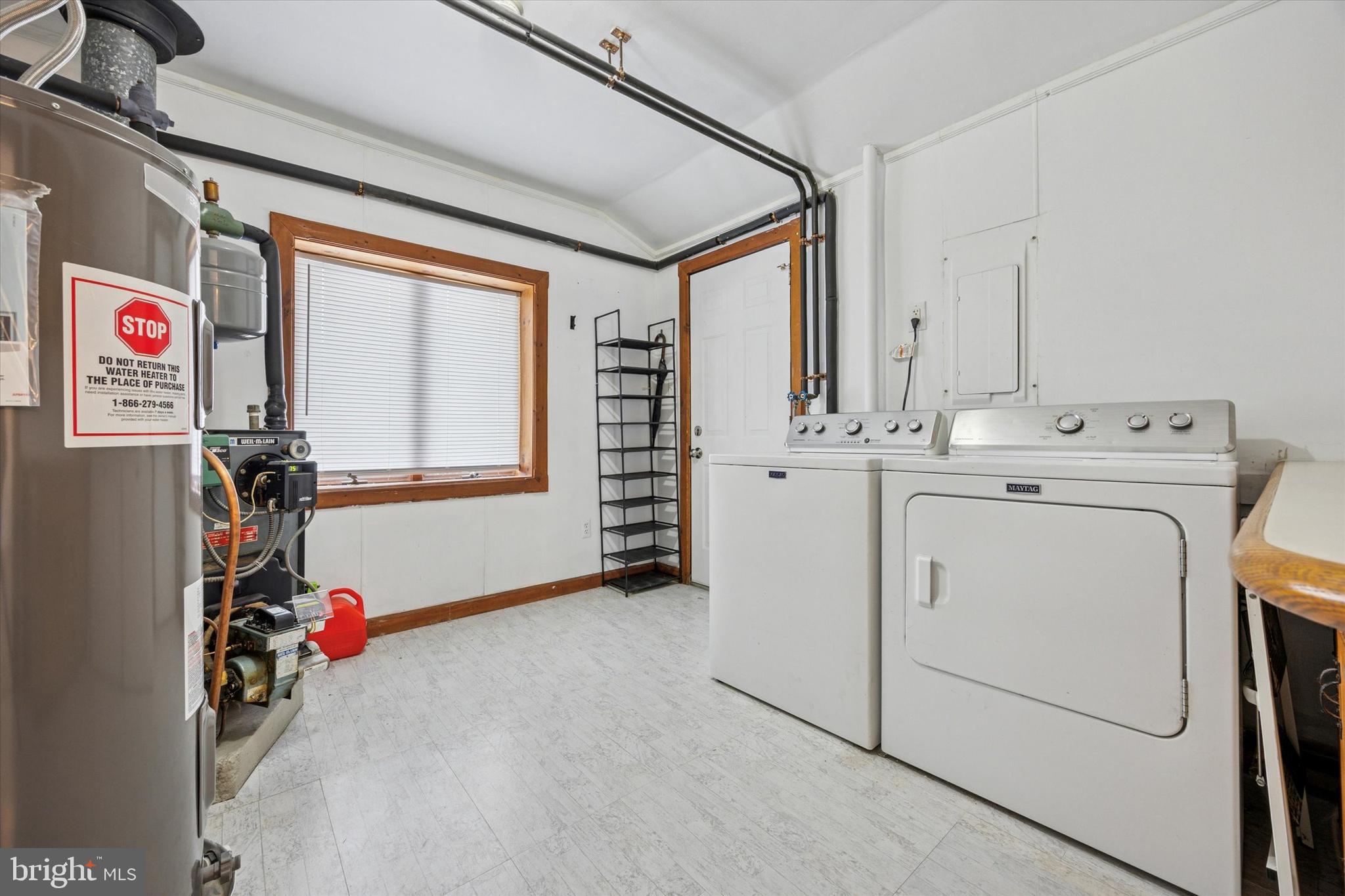 47 Cotton Road Levittown, PA 19057 - Photo 33 of 35 a utility room with dryer and washer