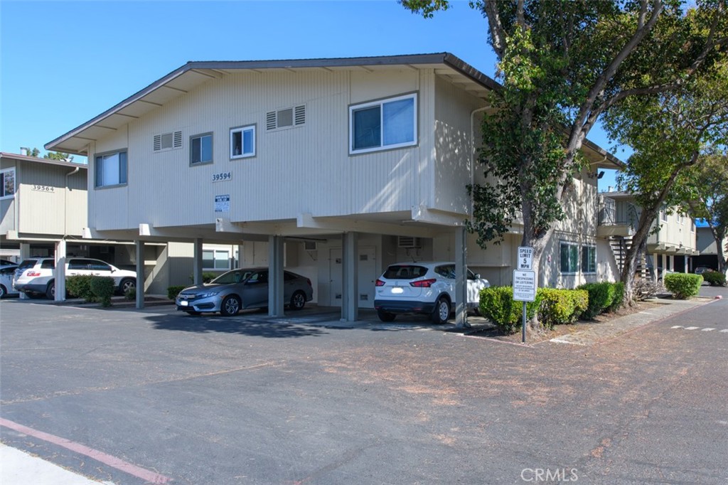 39594 Trinity Way Fremont, CA 94538 - Photo 2 of 14 a car parked in front of a building